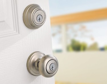 Lockset with Circular Door Knob on White Door